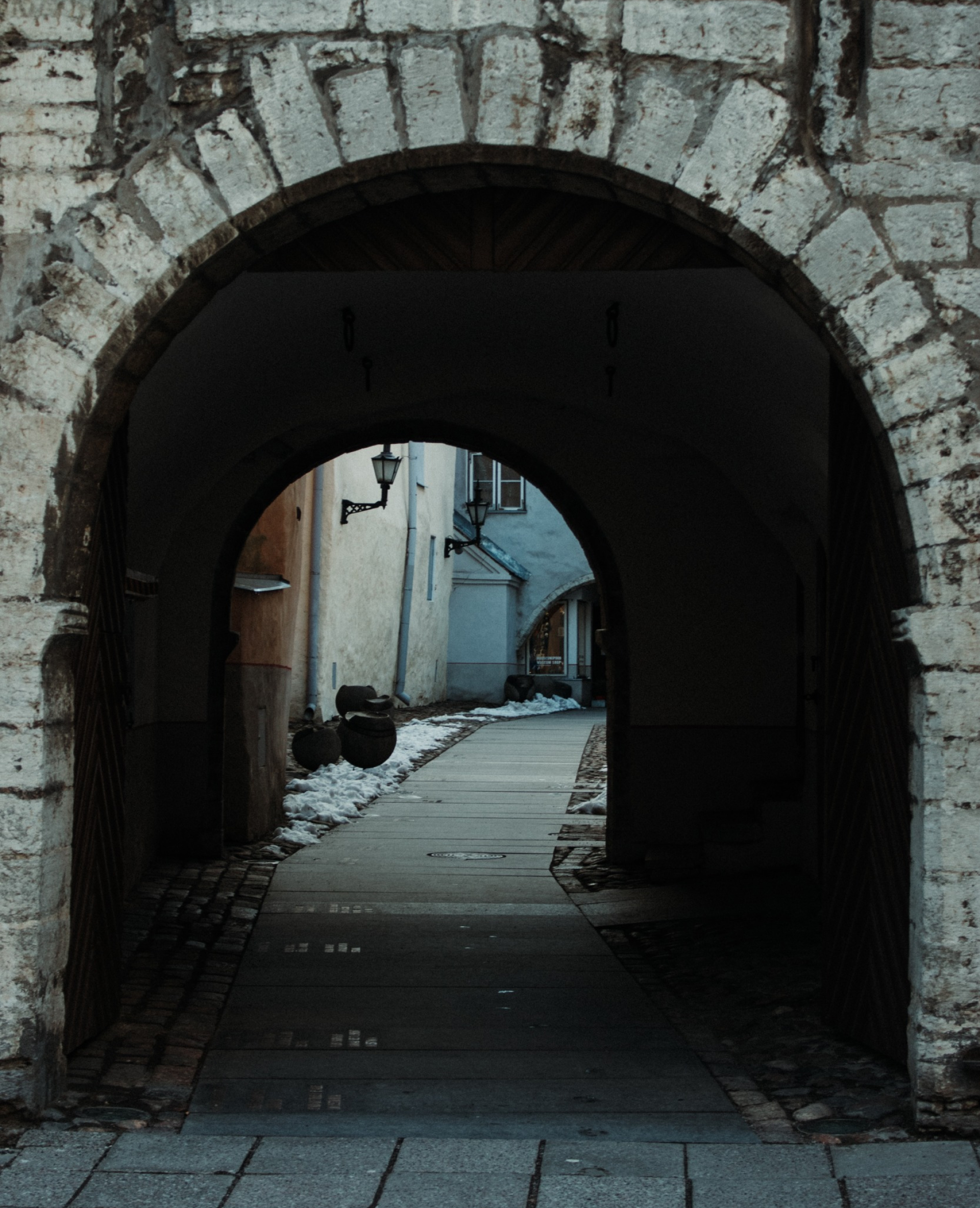 image showing a tunnel in an old town